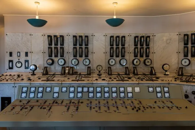 Control room panels with gauges and switchgear